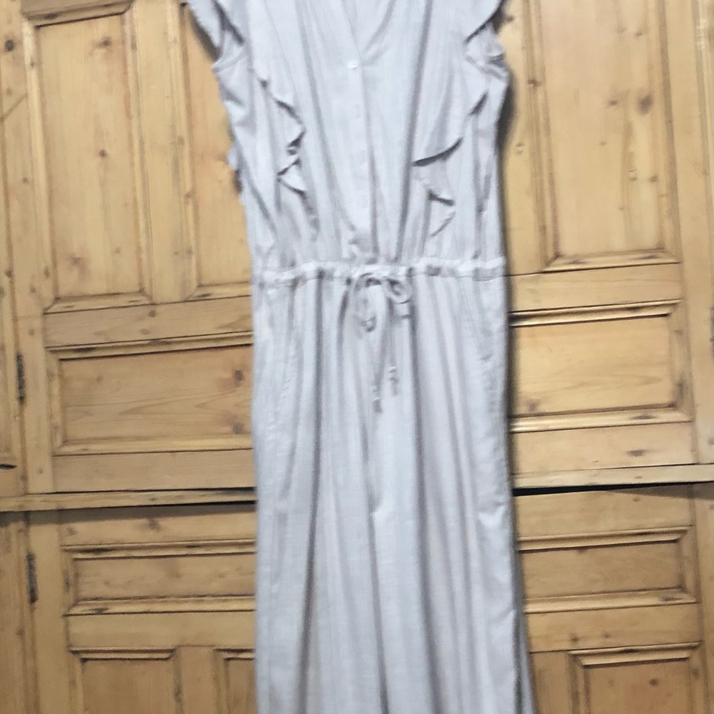 Lavender jumpsuit new without tag  pristine has pockets on the side